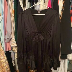 Satin long sleeve bow shirt.